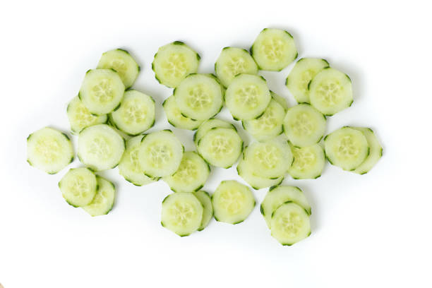 Cucumber slice isolated on white background. Top view