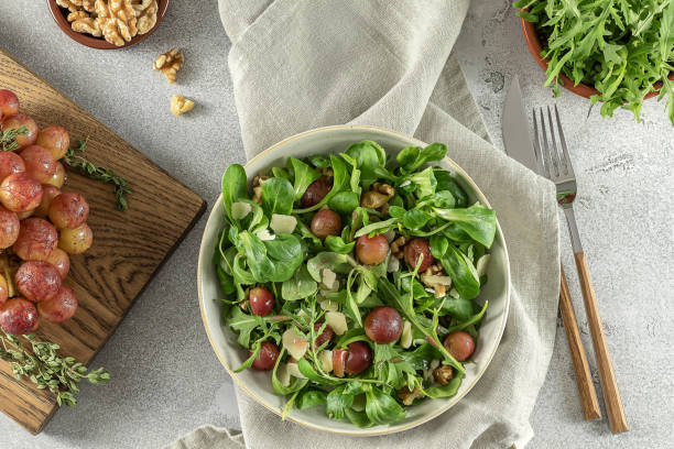 istock Roasted grapes, pecorino, walnut, and arugula salad. 1328911382