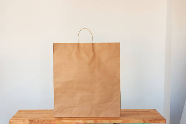 istock A  paper bag on isolated white background 1328913930