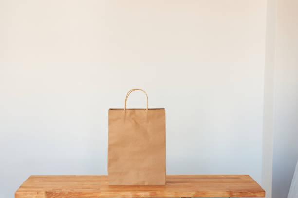istock A  paper bag on isolated white background 1328913990