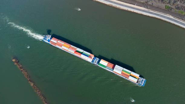 istock Industrial ship on river - aerial view 1328915448