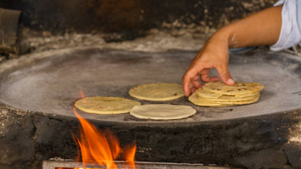 istock Guatemalan tortillas in comal 1328924452