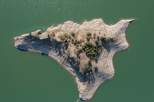 Aerial view of Island on lake. Taken via drone. Antalya, Turkey.