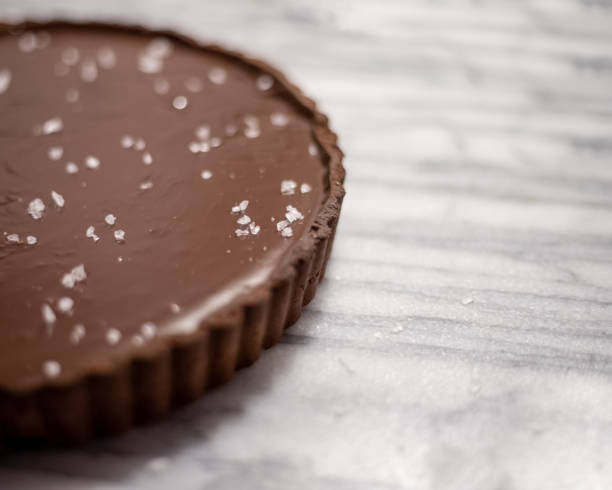 istock Dark Chocolate Ganache Salted Caramel Tart 1328930004
