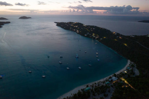 istock Aerial over St Thomas at night 1328931583