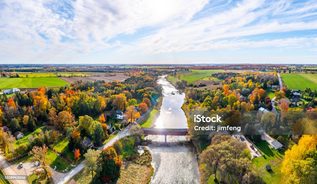 Aerial West Montrose Covered Bridge  and Grand River near Kitchener, West Montrose, Canada - Kissing Bridge Kitchener, Waterloo Regional, Canada. Kitchener - Ontario Stock Photo
