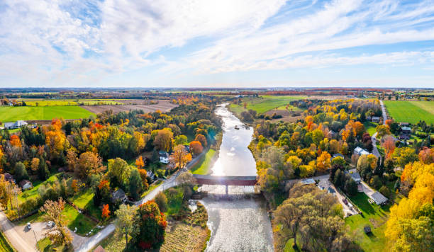 Aerial West Montrose Covered Bridge  and Grand River near Kitchener, West Montrose, Canada - Kissing Bridge Kitchener, Waterloo Regional, Canada. kitchener ontario photos stock pictures, royalty-free photos & images