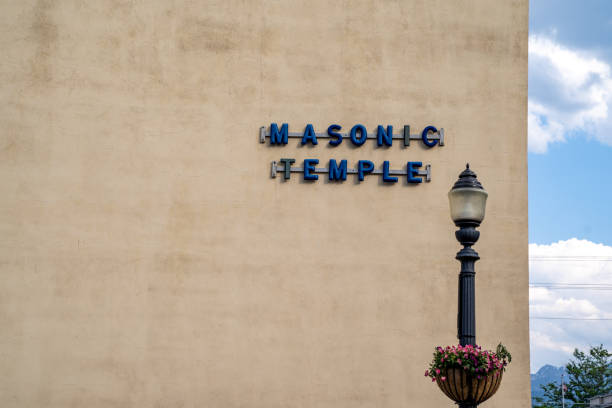 istock Sign for a masonic temple with a lightpost 1328943461