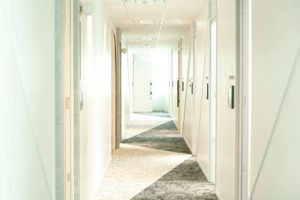 istock Long corridor with  doors 1328944500