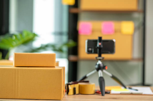 istock cardboard parcel box for online selling,Start up small business entrepreneur working online marketing packaging box delivery 1328947549