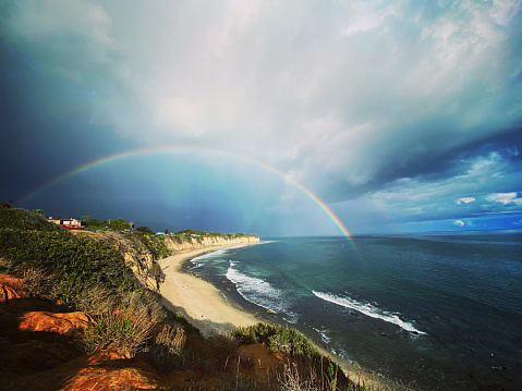 Full rainbow over the ocean in Malibu