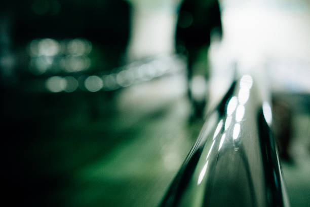 Focus on the railing, Silhouette of the man leaving