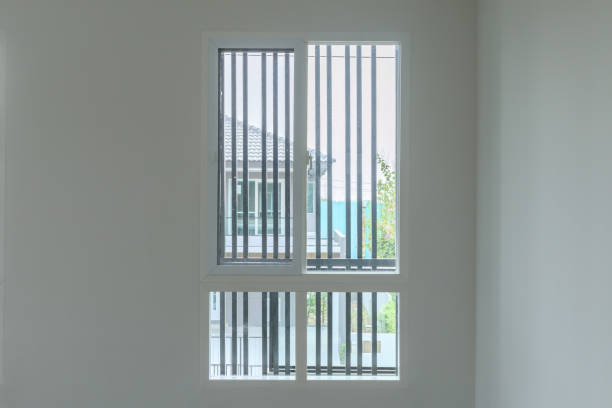 istock Glass window frame house interior on white wall 1328954220