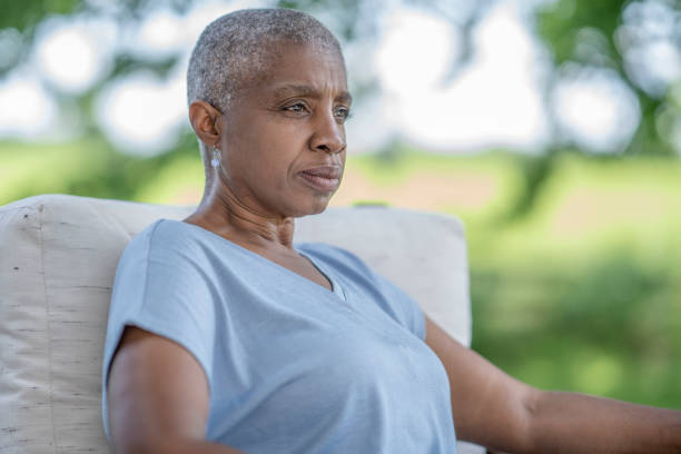 istock Pensive older woman with short hair 1328954668