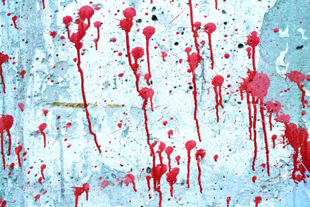 istock Red blood on the wall. Dirty concrete wall. 1328961518