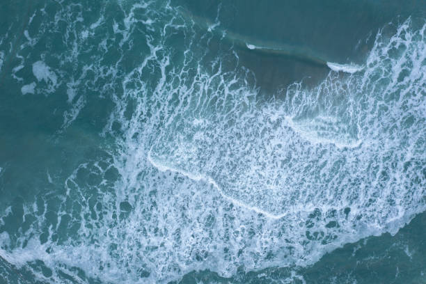 istock Sea wave running on a shallow coastal strip. 1328963298