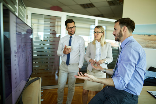 Business people working together to achieve their shared vision