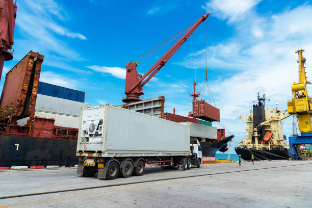 istock container ship commercial vessel alongside in port for loading and discharging containers services in maritime transports in World wide logistics 1328971413