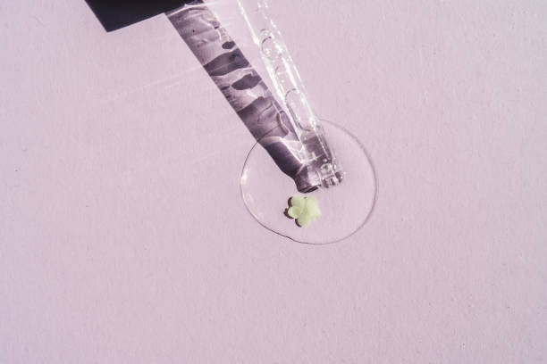 istock A cosmetic product flows out of a pipette with bubbles. 1328975427