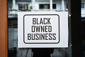 Black owned business sign