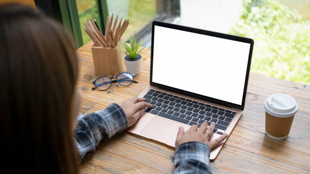 istock Female freelancer working online with computer laptop at coffee shop. 1328980648