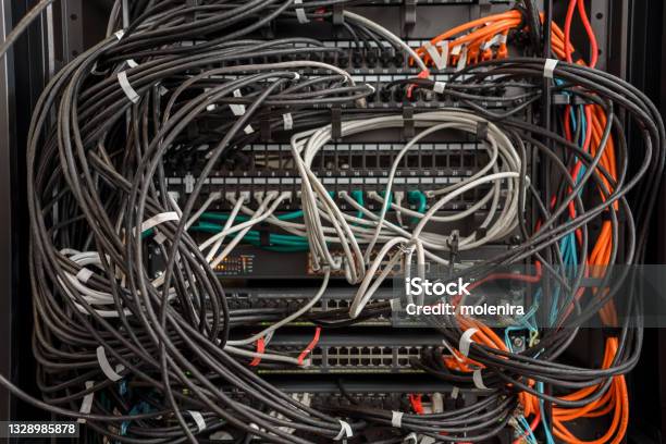 Working Hardware In Data Center Stock Photo - Download Image Now - Cable, Network Server, Messy