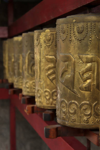 istock Tibetan prayer wheels in a Buddhist temple in Dharamsala 1328988069