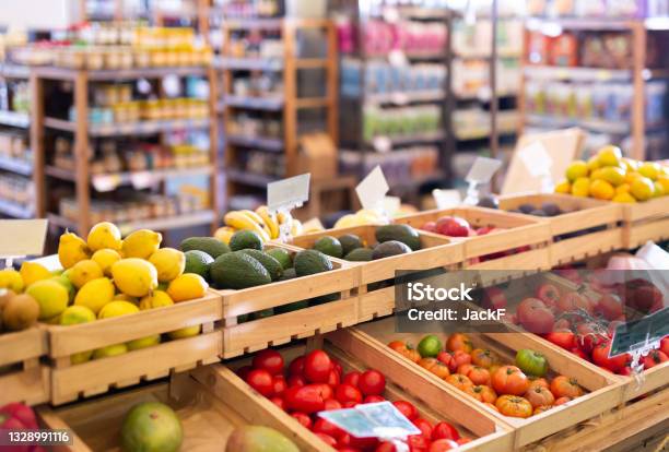 Fresh Vegetables And Fruits On Counter In Grocery Supermarket Stock Photo - Download Image Now