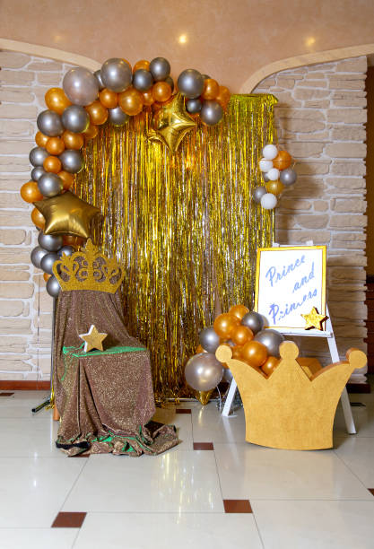 istock Balloons and throne with crown for prince and princess 1328991196