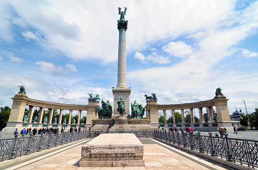 The Heroes Square in Budapest against a bright blue sky