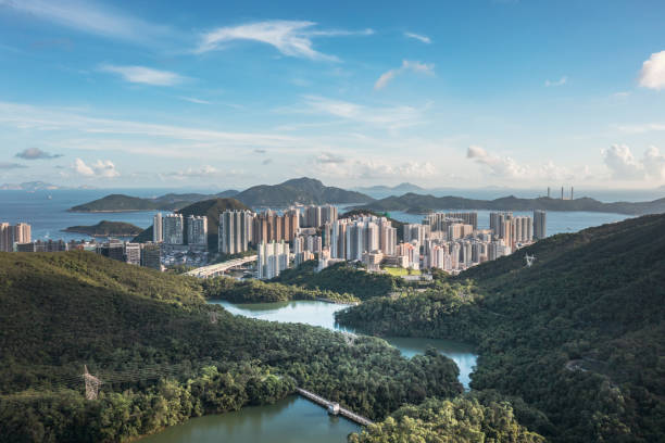 Amazing aerial view of Aberdeen and reservoir, the famous tourist place in the south of Hong Kong. Clear summer day. Amazing aerial view of Aberdeen and reservoir, the famous tourist place in the south of Hong Kong. Clear summer day. aberdeen hong kong photos stock pictures, royalty-free photos & images