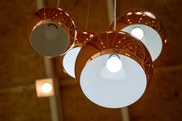 istock A modern designed sphere ceiling lighting lamp in rose gold color. 1329000396