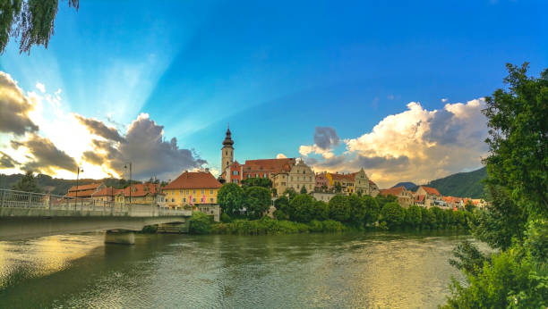 The charming little town of Frohnleiten on the Mur river in the district of Graz-Umgebung, Styria region, Austria The charming little town of Frohnleiten on the Mur river in the district of Graz-Umgebung, Styria region, Austria frohnleiten stock pictures, royalty-free photos & images