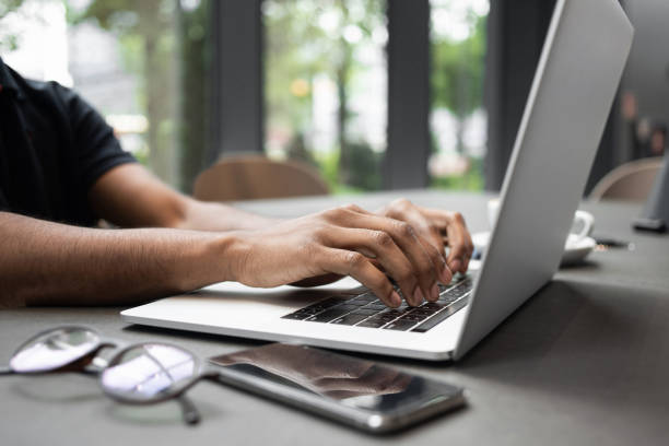 istock Businessman or journalist working at office 1329005243