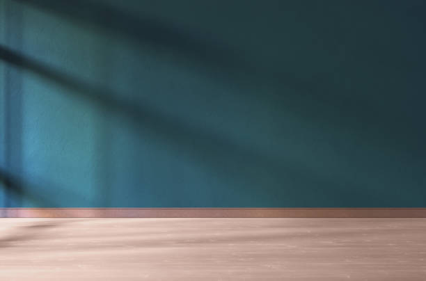 istock 3D rendering of empty room. Wooden floor and teal wall. 1329011267