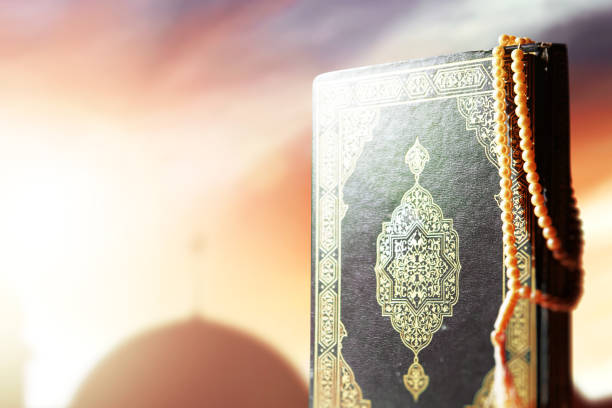 istock Quran and prayer beads on the table 1329012747