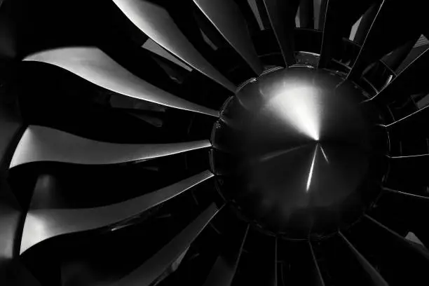 Modern turbofan engine. close up of turbojet of aircraft on black background. blades of the turbofan engine of the aircraft.