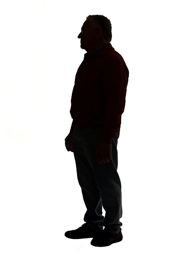 silhouette of a senior man on white backgound