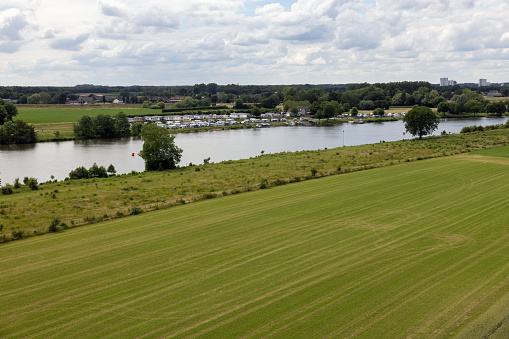 Aerial view of Dutch river Meuse near Wellerlooi, small village in province Limburg