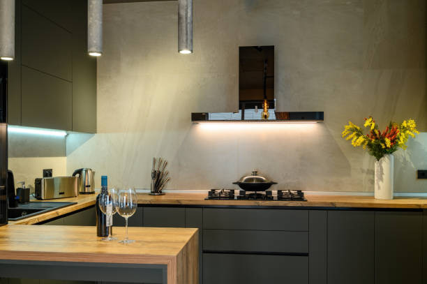 istock Modern large luxury dark gray kitchen closeup 1329028162