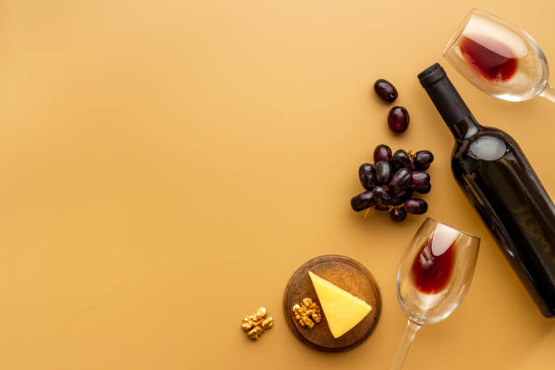 istock Red wine bottle with glasses and bunch of grape 1329029421