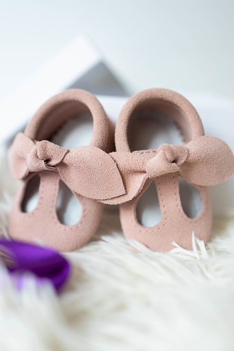 Baby shoes on isolated white background