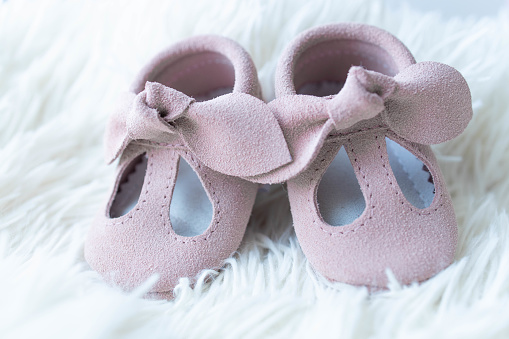 Children's retro used shoes on a white background