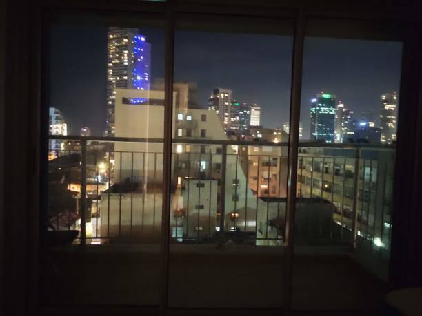 istock View from window -  night lights city 1329036973