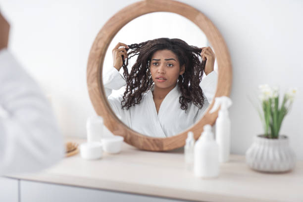 hairloss, dry, curly hair. health and beauty problems - female emotional stress african ethnicity loss imagens e fotografias de stock