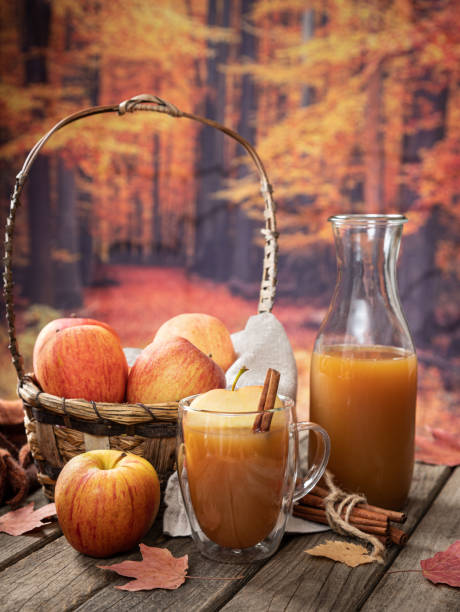 istock Glass of Apple Cider and Fresh Apples 1329038018
