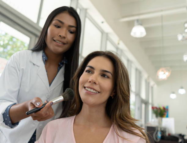istock Beautiful woman at a make-up studio getting her makeup done 1329039693