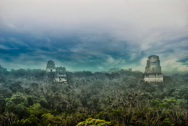 The 3 Mayan Temples at Tikal from the Temple of the Jaguar Priest Peten Guatemala