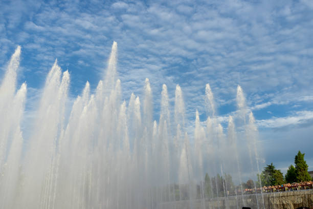 istock City fountain under blue sky and white clouds 1329042424