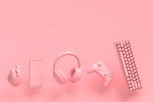 istock Flying gamer gears like mouse, keyboard, joystick, headset, VR on pink 1329045613